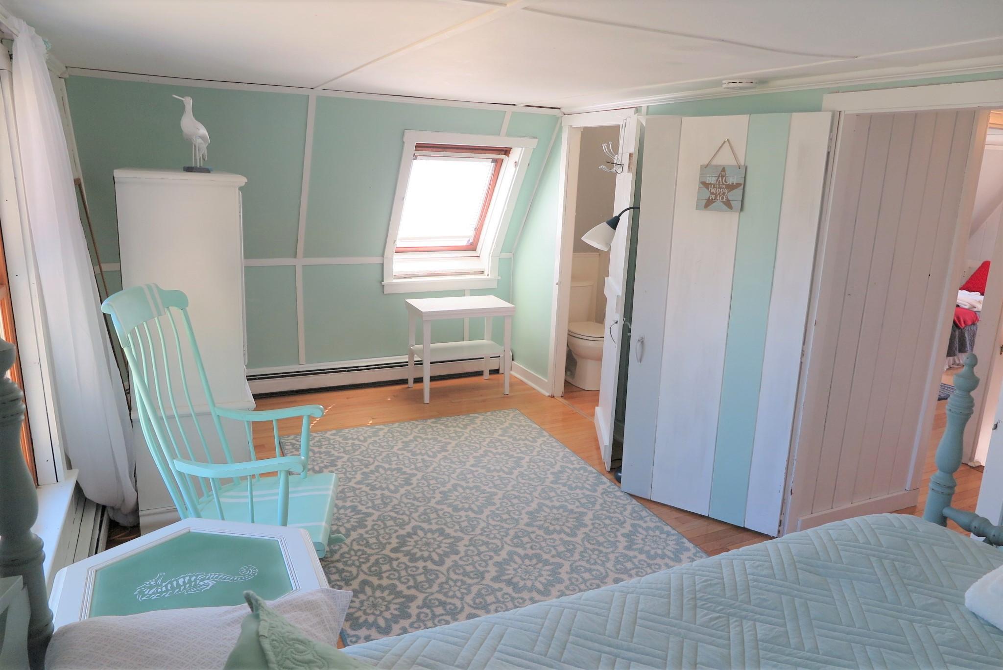 42 Bain Road Dennis Port, MA 02639 - Photo 24 of 46 a living room with furniture and a window