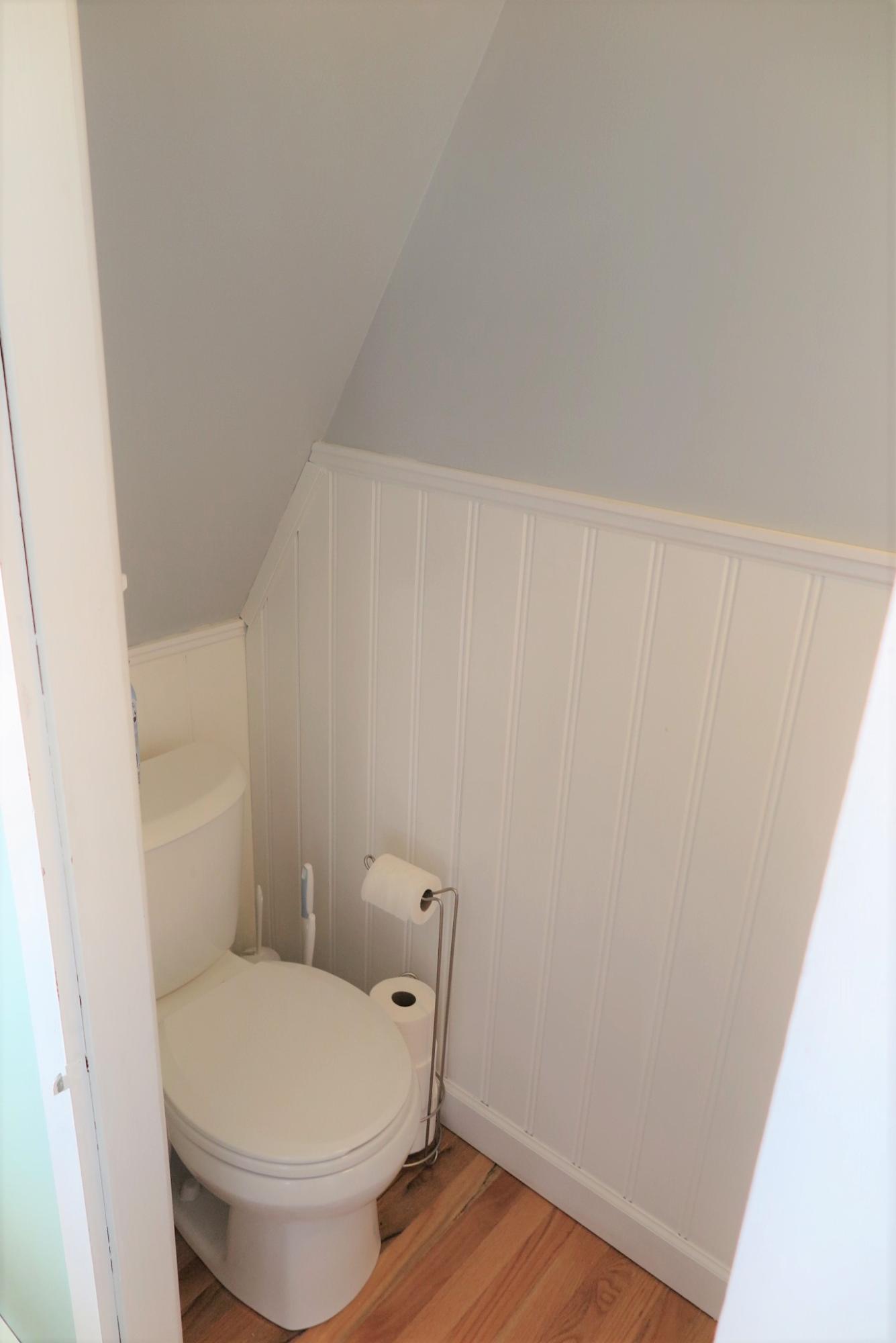 42 Bain Road Dennis Port, MA 02639 - Photo 27 of 46 a white toilet sitting next to a shower