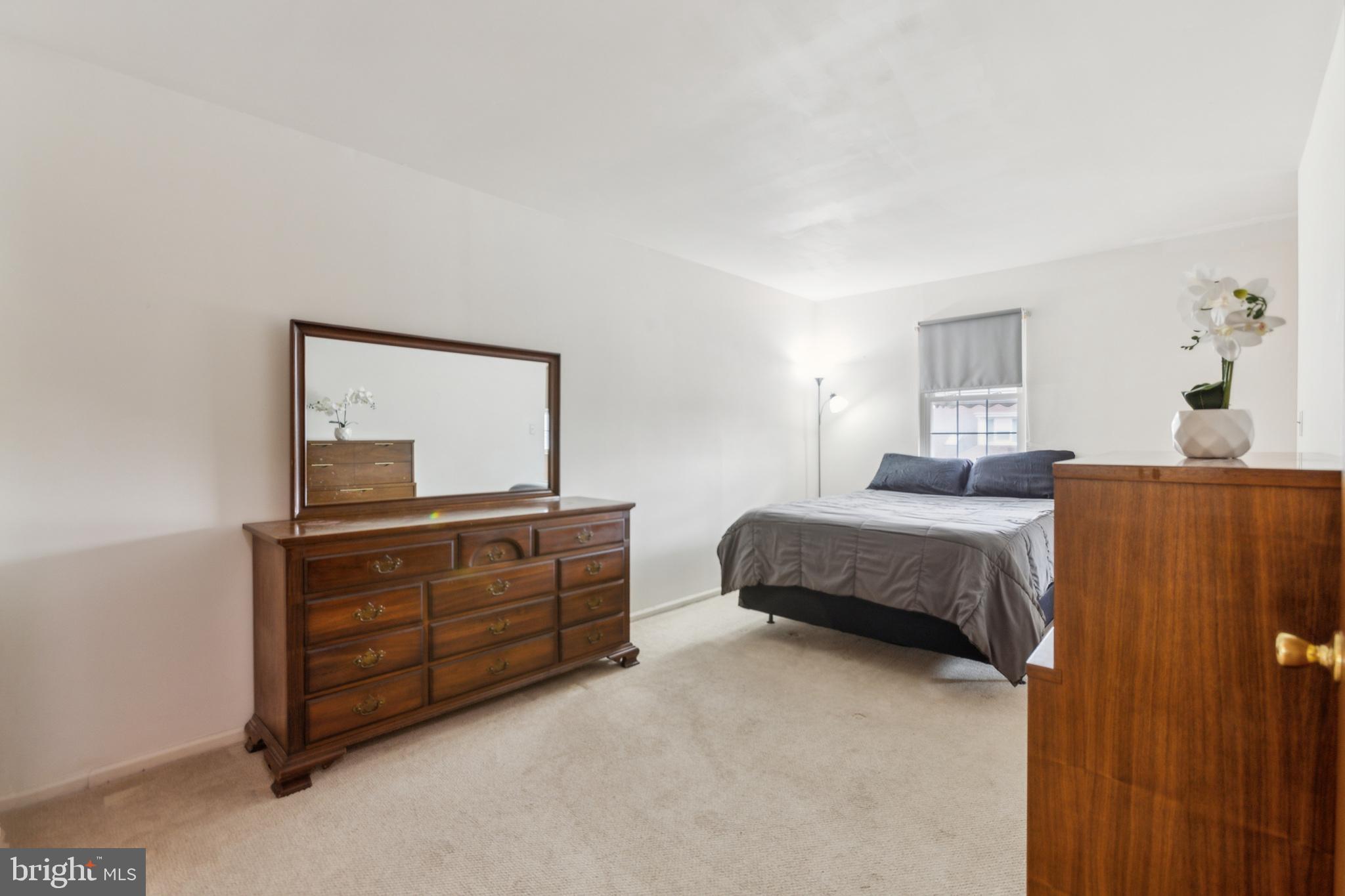 103 Upper Valley Lane Newark, DE 19711 - Photo 14 of 31 a bedroom with a bed and a dresser