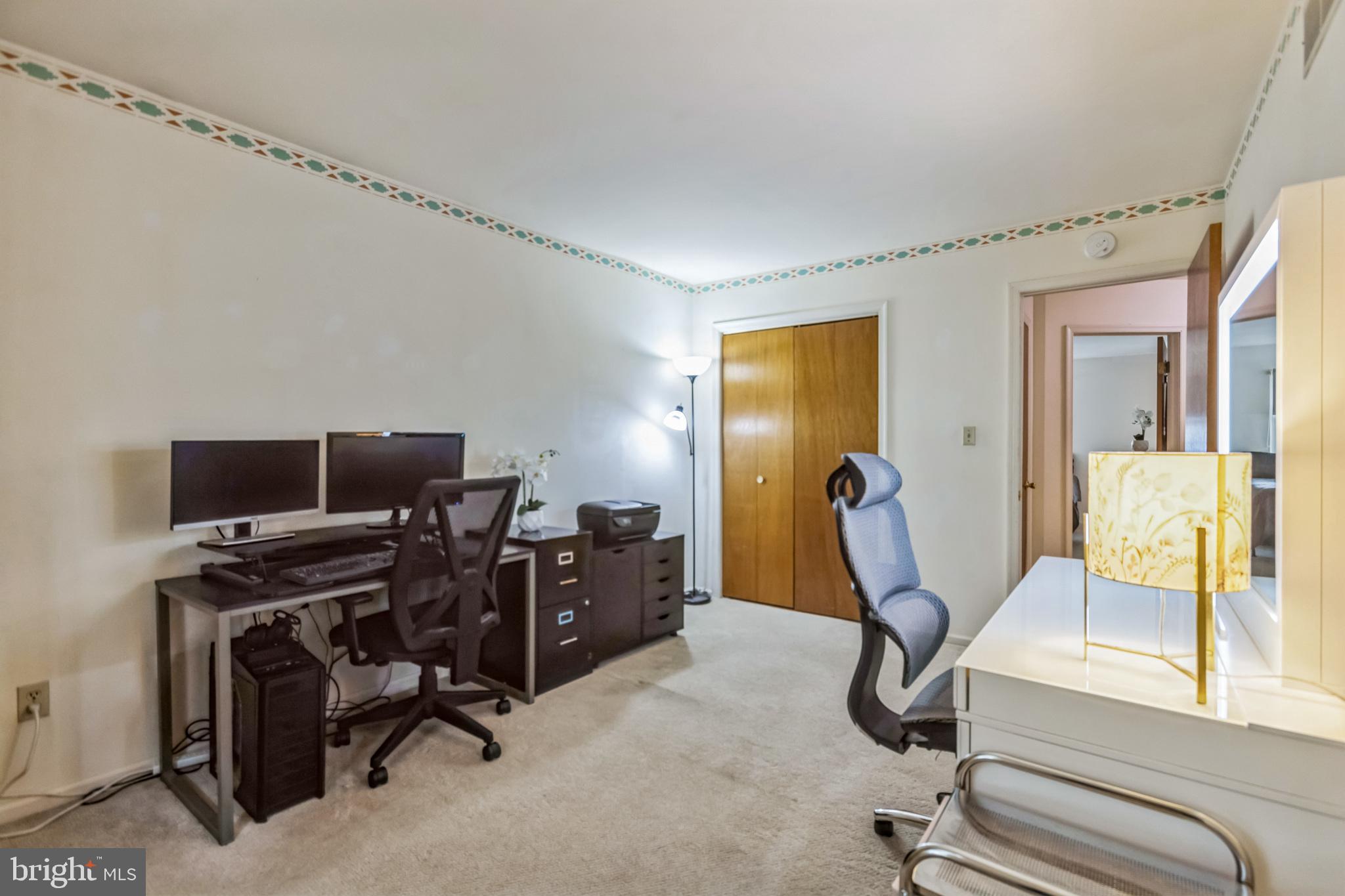 103 Upper Valley Lane Newark, DE 19711 - Photo 17 of 31 a view of a workspace with furniture and a window