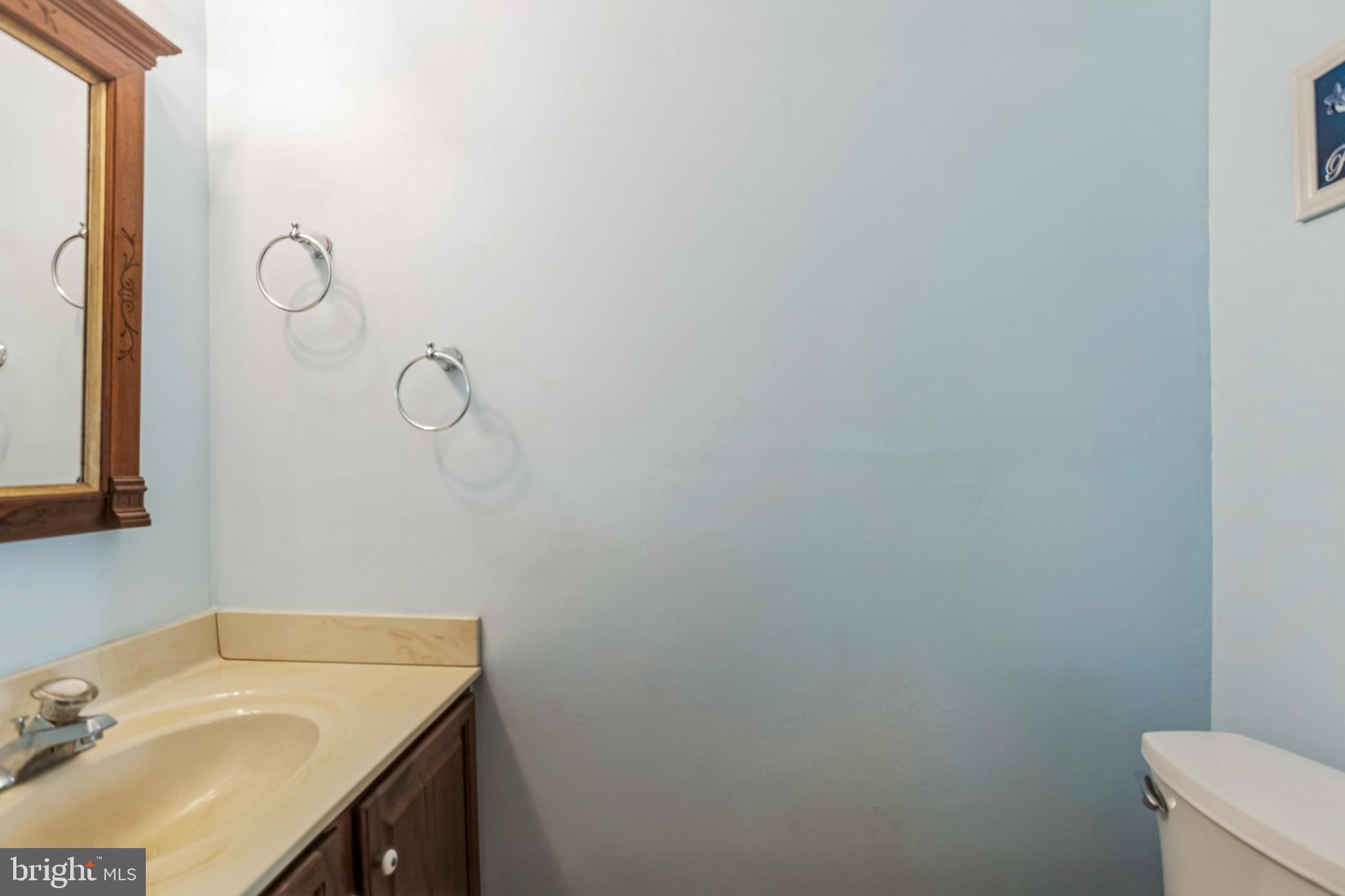 103 Upper Valley Lane Newark, DE 19711 - Photo 18 of 31 a bathroom with a sink and vanity