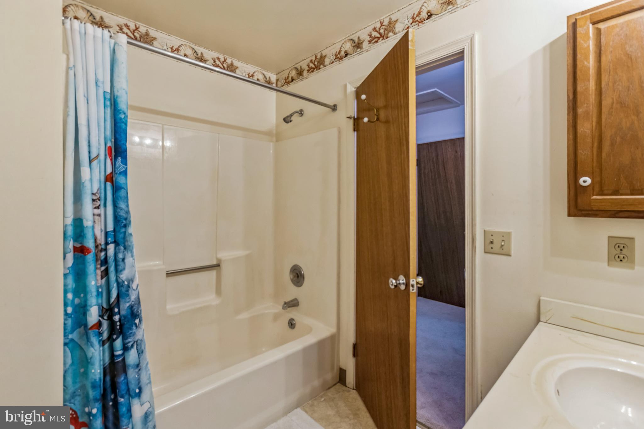 103 Upper Valley Lane Newark, DE 19711 - Photo 20 of 31 a bathroom with a bathtub and a shower