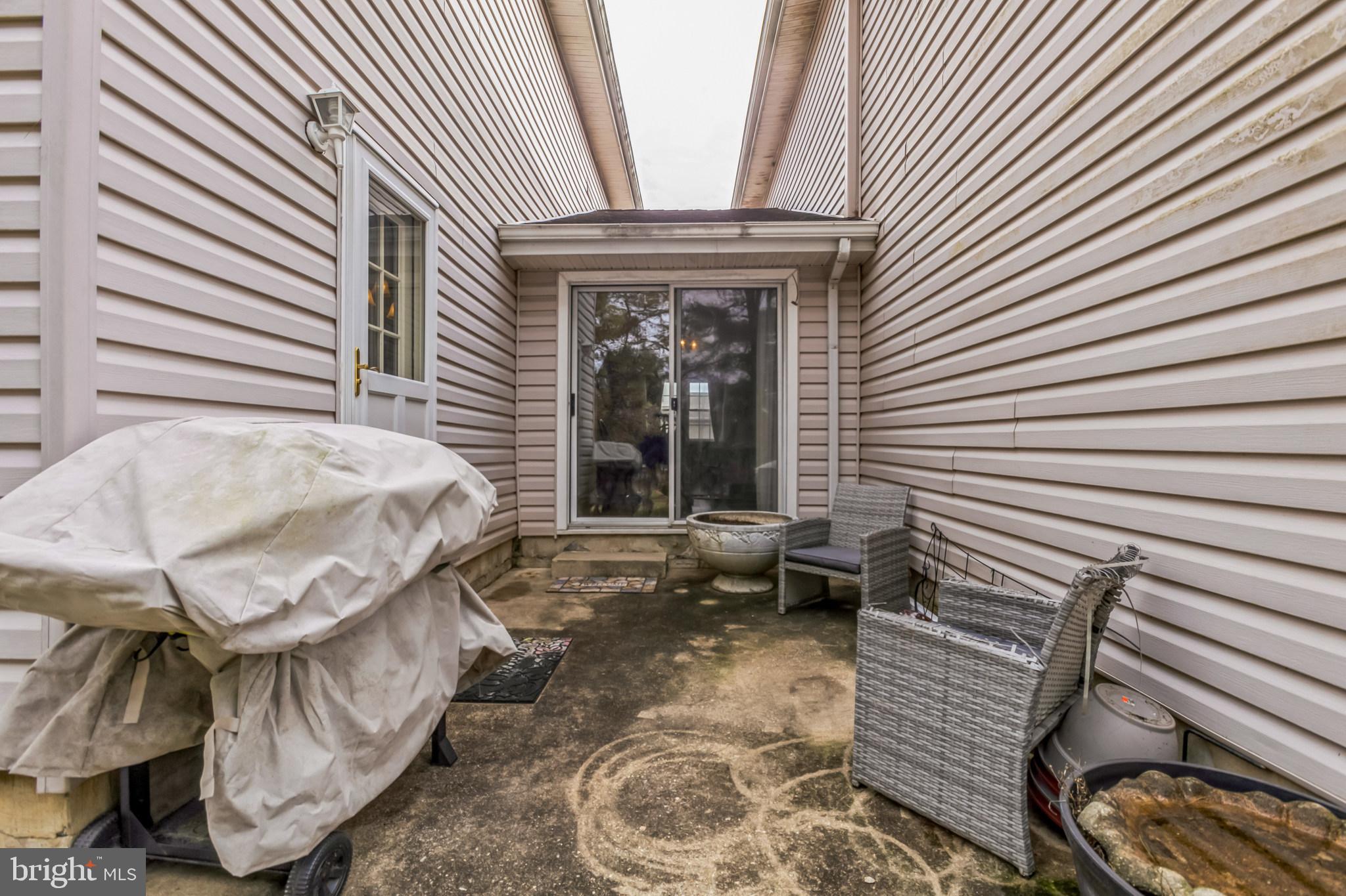 103 Upper Valley Lane Newark, DE 19711 - Photo 27 of 31 a view of a porch with furniture