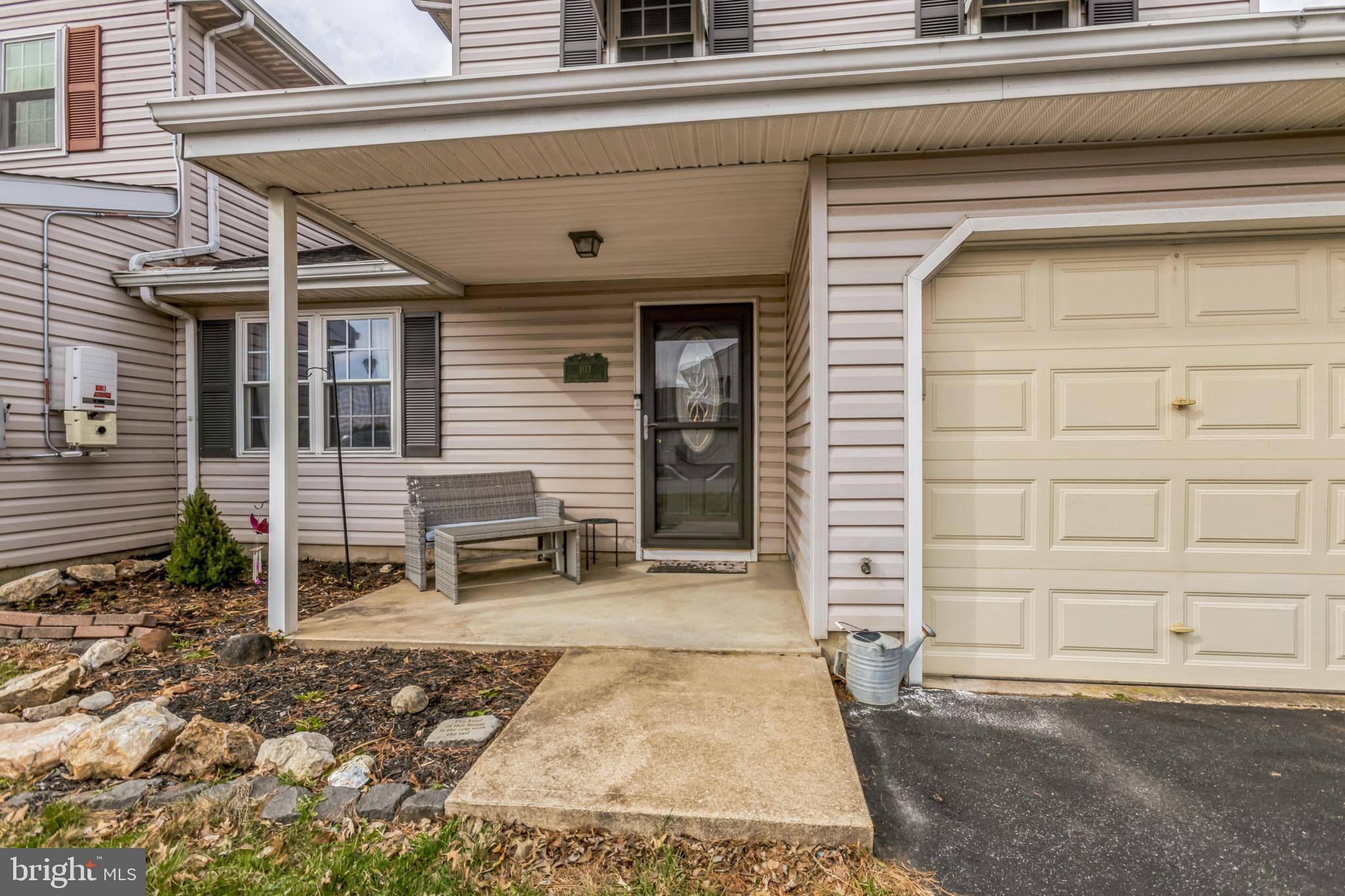 103 Upper Valley Lane Newark, DE 19711 - Photo 3 of 31 a backyard of a house with seating space