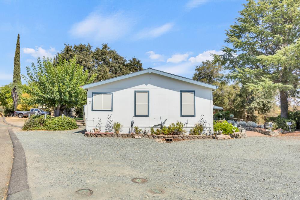 2000 Camanche Road, Unit 31 Ione, CA 95640 - Photo 11 of 43 a view of a house with wooden fence