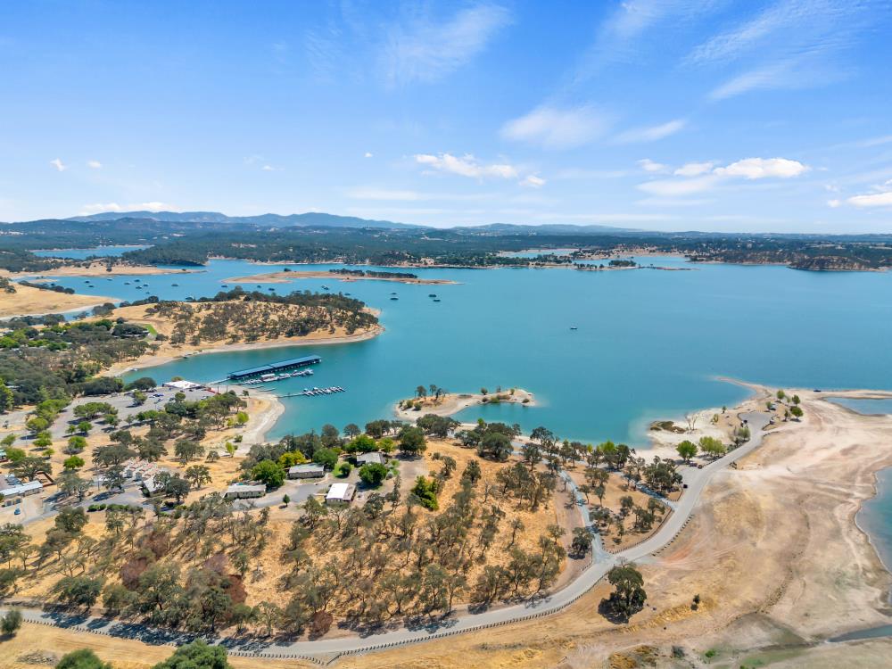 2000 Camanche Road, Unit 31 Ione, CA 95640 - Photo 13 of 43 a view of a lake with a mountain