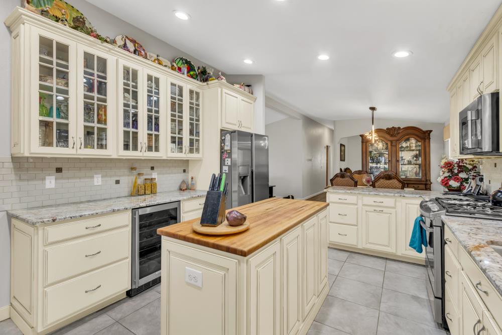2000 Camanche Road, Unit 31 Ione, CA 95640 - Photo 22 of 43 a kitchen with a sink stove and cabinets
