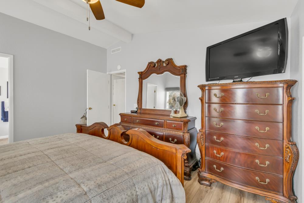 2000 Camanche Road, Unit 31 Ione, CA 95640 - Photo 34 of 43 a bedroom with a bed and a flat screen tv