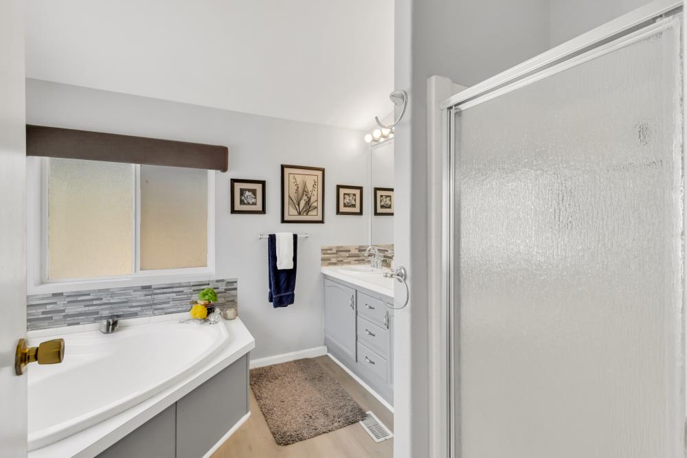 2000 Camanche Road, Unit 31 Ione, CA 95640 - Photo 35 of 43 a bathroom with a sink a bathtub and a shower