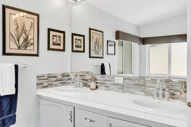 a bathroom with a sink and a bathtub