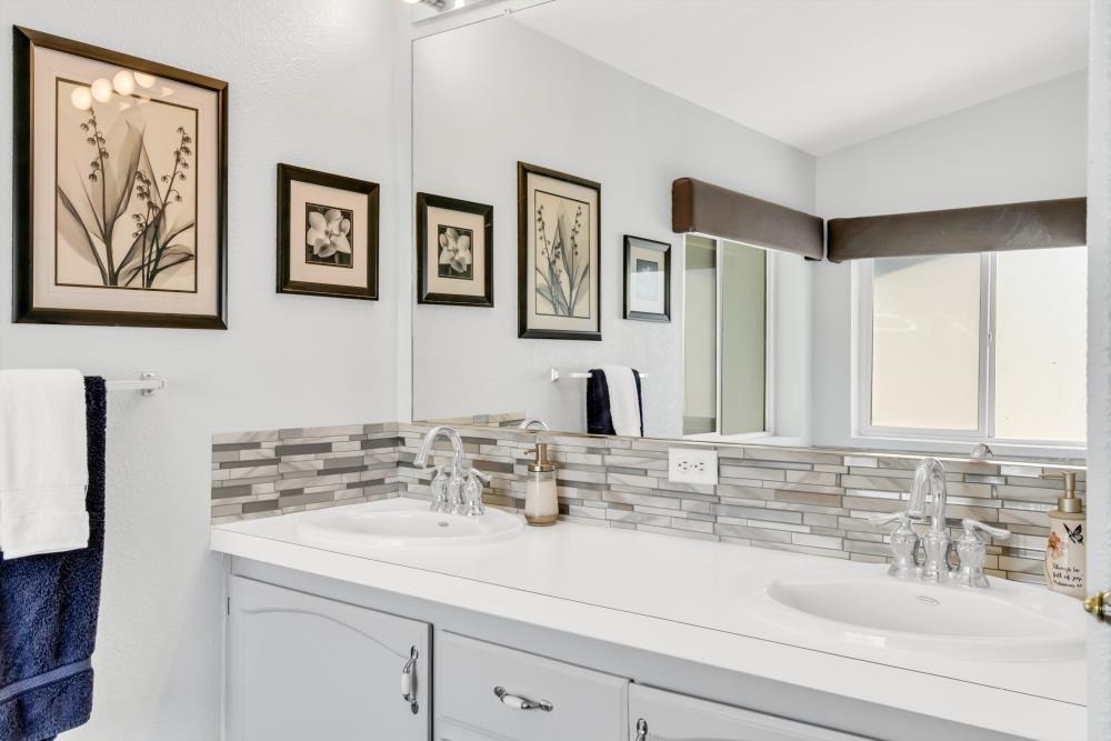 2000 Camanche Road, Unit 31 Ione, CA 95640 - Photo 37 of 43 a bathroom with a sink and a mirror