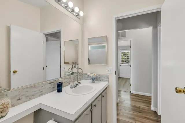 a white refrigerator freezer sitting inside of a kitchen