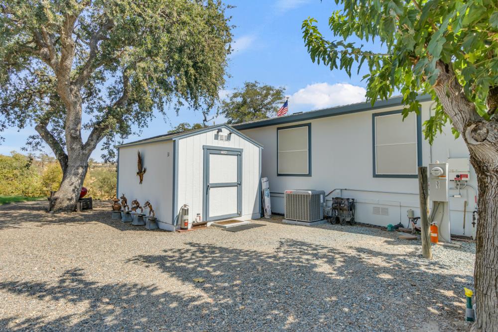 2000 Camanche Road, Unit 31 Ione, CA 95640 - Photo 10 of 43 a view of a house with a patio