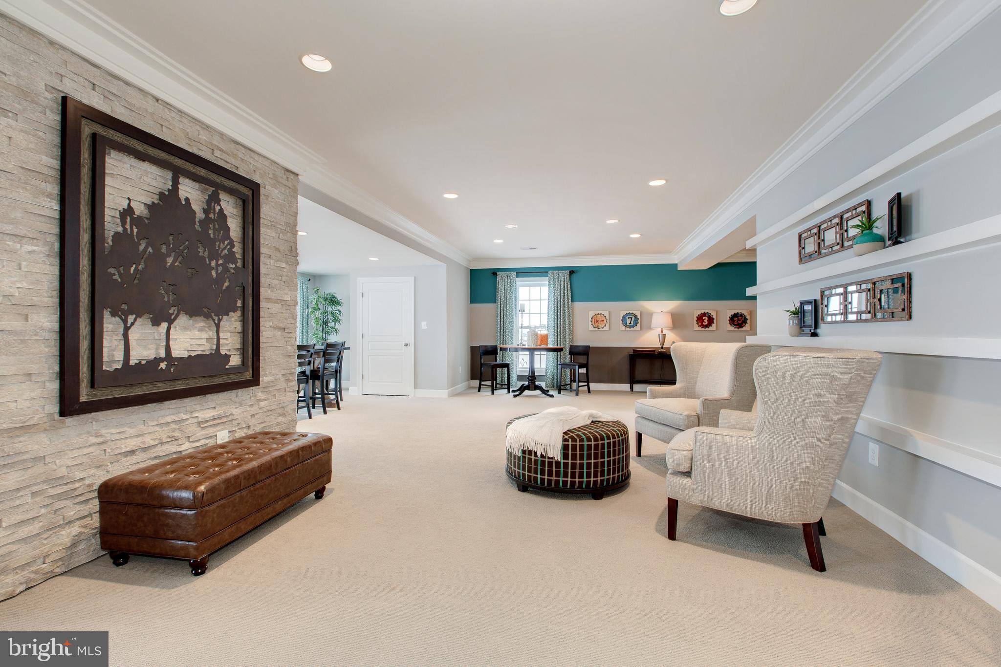 14732 Raptor Ridge Way Leesburg, VA 20176 - Photo 44 of 49 Stone accent wall and built in shelving