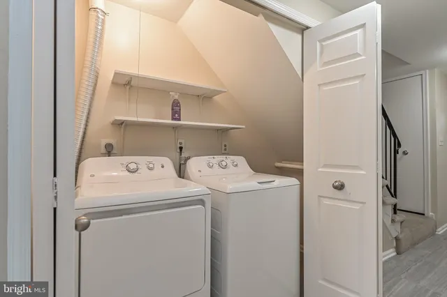 a utility room with dryer and washer
