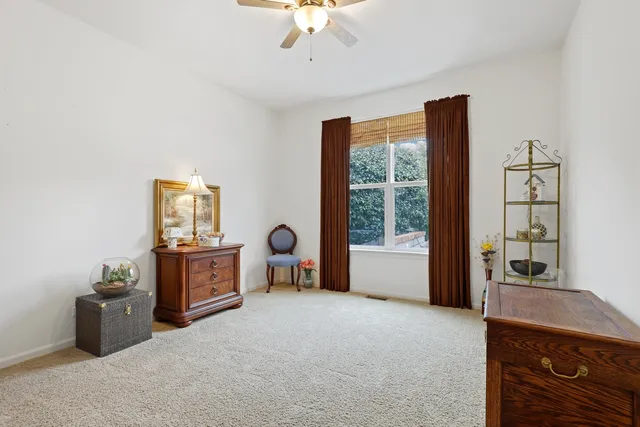 a room with furniture and a window