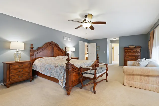 a bedroom with a bed and furniture