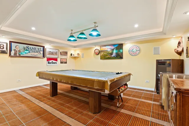 a room with furniture pool table and a table