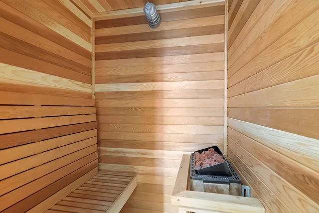 a bathroom with a bathtub and shower