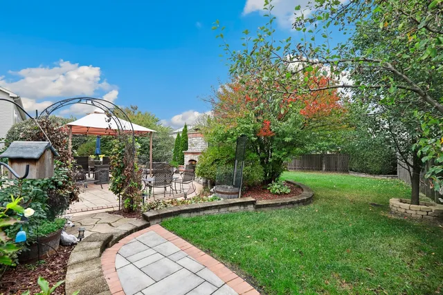 a view of a chair and table of the garden