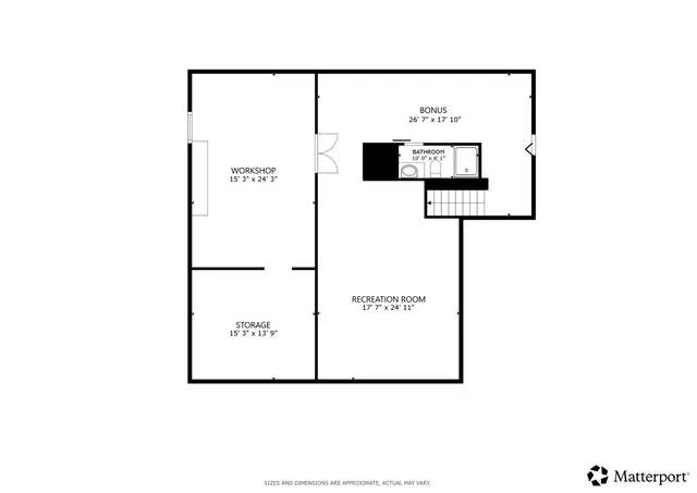 a picture of a bench in front of a wall