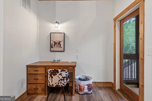 a backyard of a house with lots of green space