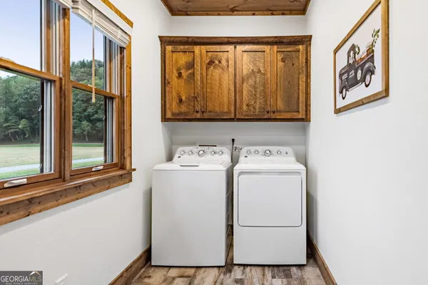 a view of a lake with a sitting area