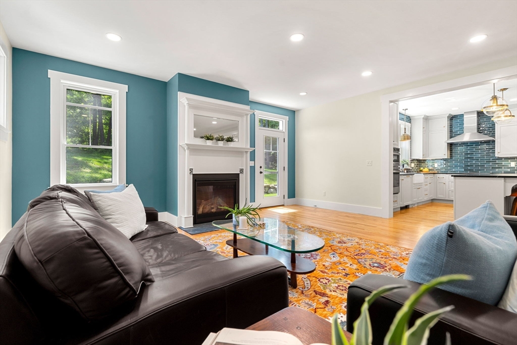 158 Warren Road Townsend, MA 01469 - Photo 14 of 41 a living room with furniture fireplace and a table