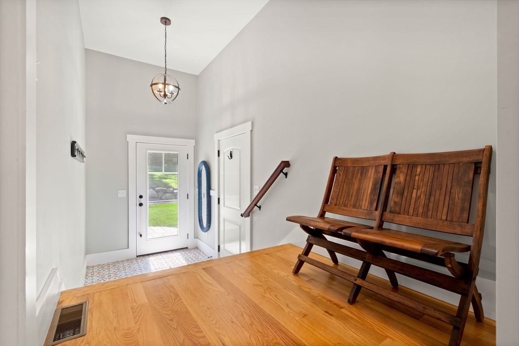 158 Warren Road Townsend, MA 01469 - Photo 16 of 41 a bedroom with furniture and wooden floor