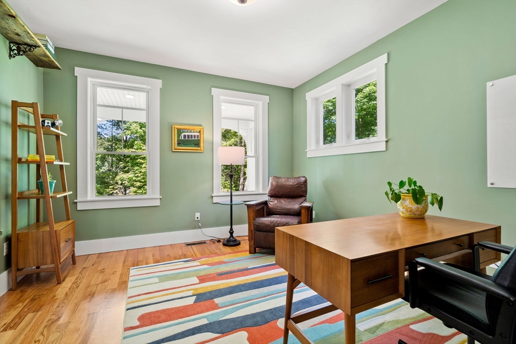 158 Warren Road Townsend, MA 01469 - Photo 18 of 41 a bedroom with a bed window and table