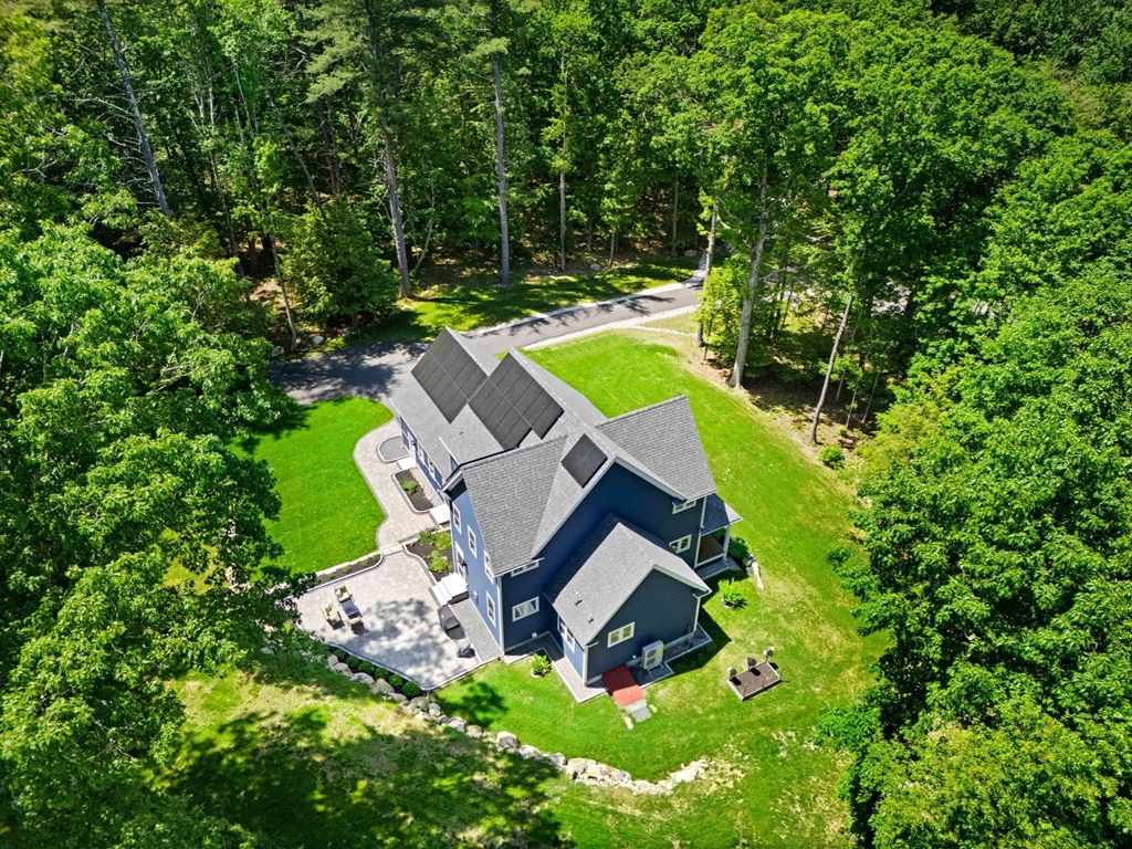 158 Warren Road Townsend, MA 01469 - Photo 3 of 41 an aerial view of a house with swimming pool and garden