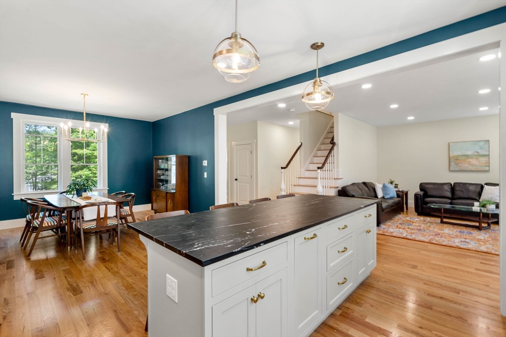 158 Warren Road Townsend, MA 01469 - Photo 8 of 41 a kitchen with stainless steel appliances granite countertop a stove and a kitchen island