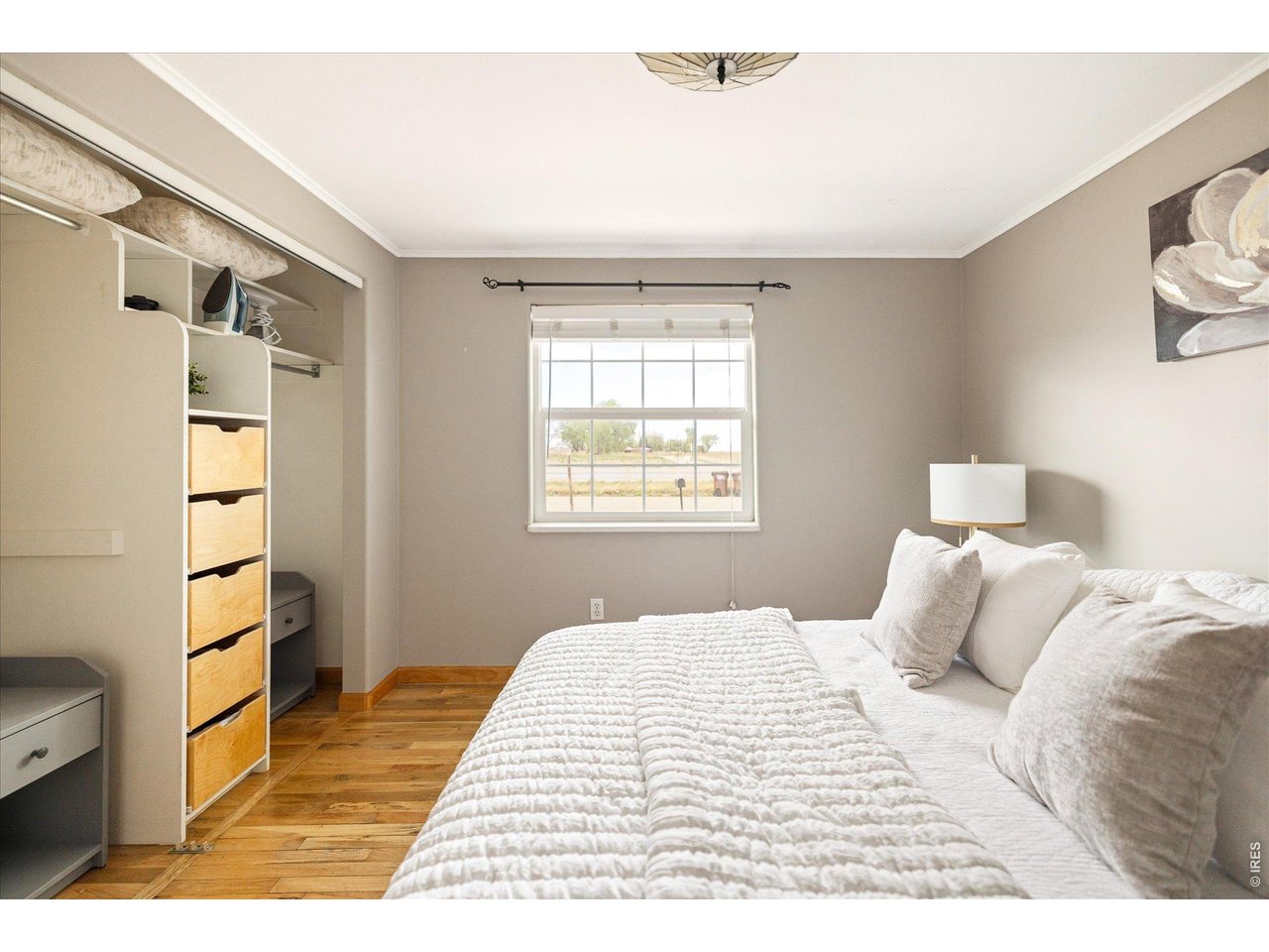 9234 Arapahoe Road Boulder, CO 80303 - Photo 19 of 37 secondary bedroom with open closet system providing convenient storage and organization