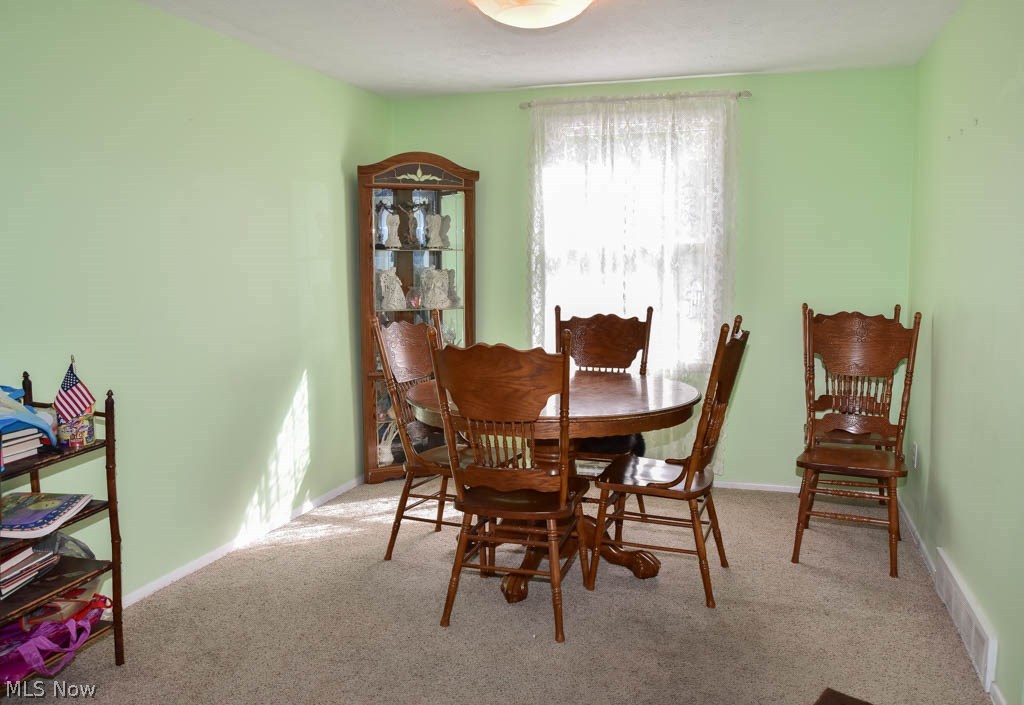 4091 Springdale Road Stow, OH 44224 - Photo 3 of 13 The dining room is open to the living room.