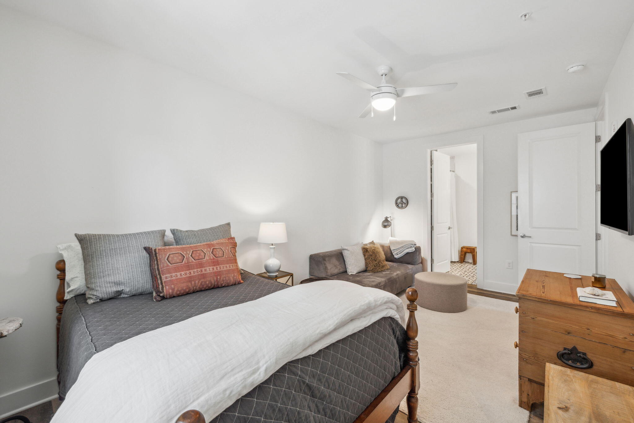 179 South County Highway 393, Unit 327 Santa Rosa Beach, FL 32459 - Photo 14 of 31 a bedroom with a bed and a flat screen tv