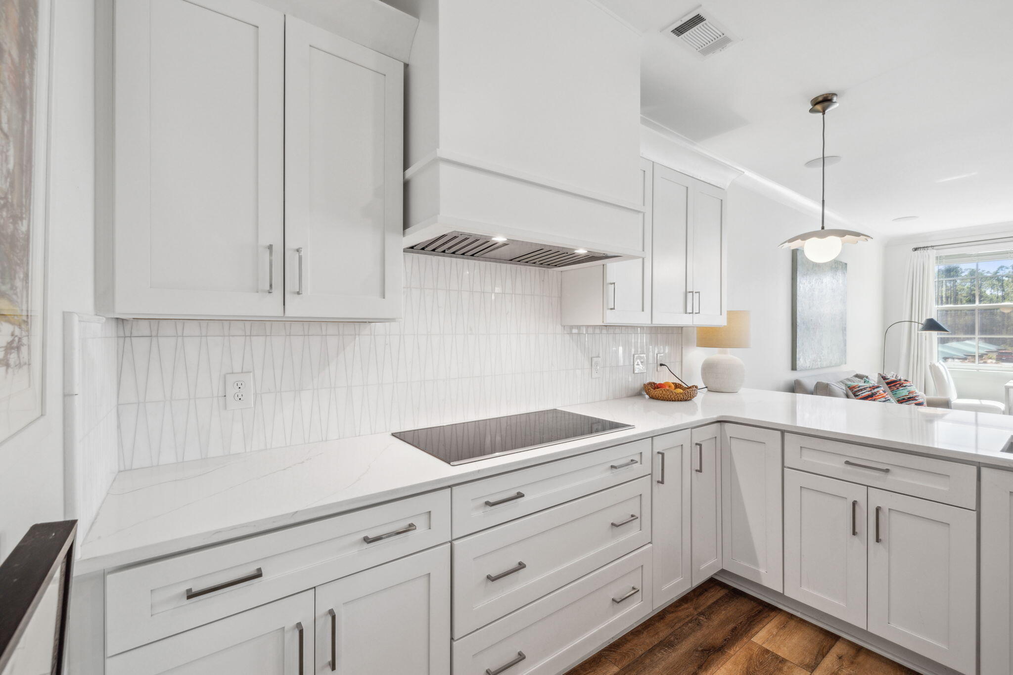 179 South County Highway 393, Unit 327 Santa Rosa Beach, FL 32459 - Photo 2 of 31 a kitchen with white cabinets and white appliances