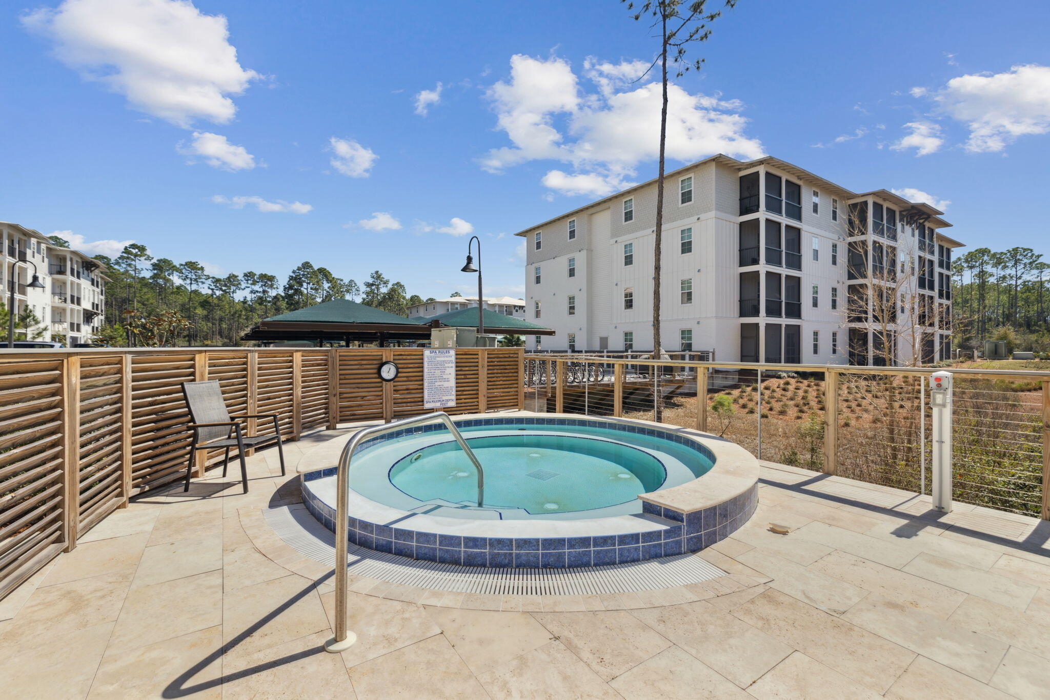 179 South County Highway 393, Unit 327 Santa Rosa Beach, FL 32459 - Photo 22 of 31 a view of a swimming pool with a patio