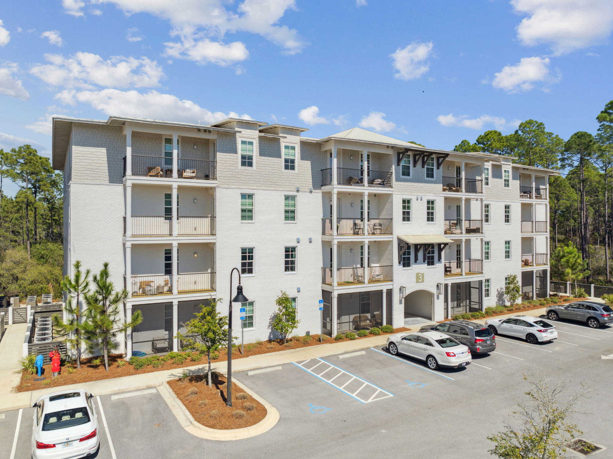 179 South County Highway 393, Unit 327 Santa Rosa Beach, FL 32459 - Photo 29 of 31 a front view of a building with street view