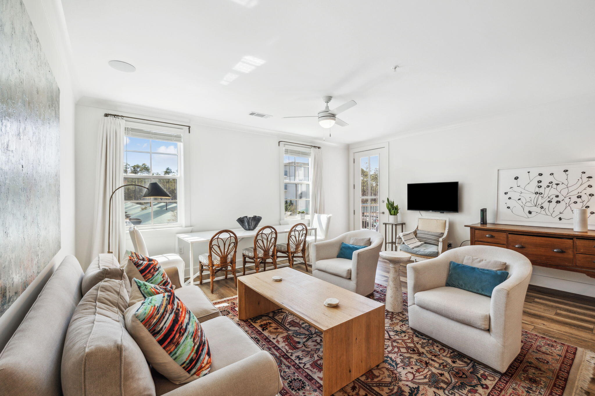 179 South County Highway 393, Unit 327 Santa Rosa Beach, FL 32459 - Photo 8 of 31 a living room with furniture and a flat screen tv