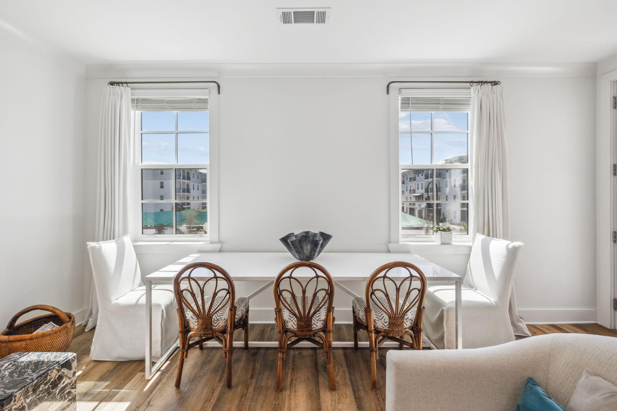 179 South County Highway 393, Unit 327 Santa Rosa Beach, FL 32459 - Photo 10 of 31 a view of a dining room with furniture window and wooden floor