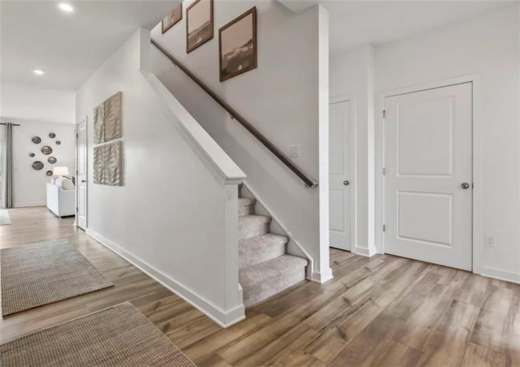 74 Poplar Blf Way Jefferson, GA 30549 - Photo 5 of 32 a view of entryway and hall with wooden floor