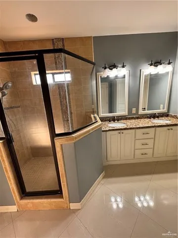 a view of a refrigerator in kitchen