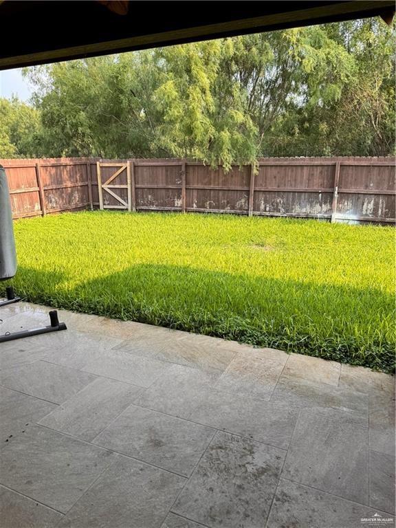 1216 East Balboa Avenue McAllen, TX 78503 - Photo 16 of 16 a view of a backyard with a small pool