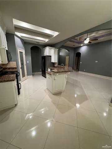 a view of living room with furniture and a flat screen tv