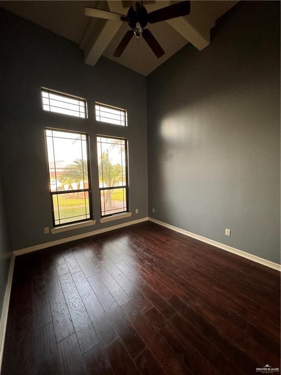 1216 East Balboa Avenue McAllen, TX 78503 - Photo 6 of 16 an empty room with wooden floor and windows