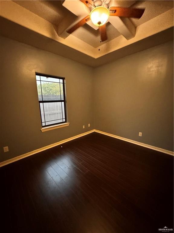1216 East Balboa Avenue McAllen, TX 78503 - Photo 10 of 16 a view of an empty room with wooden floor and a window