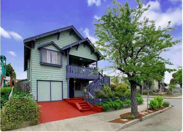 a front view of a house with yard