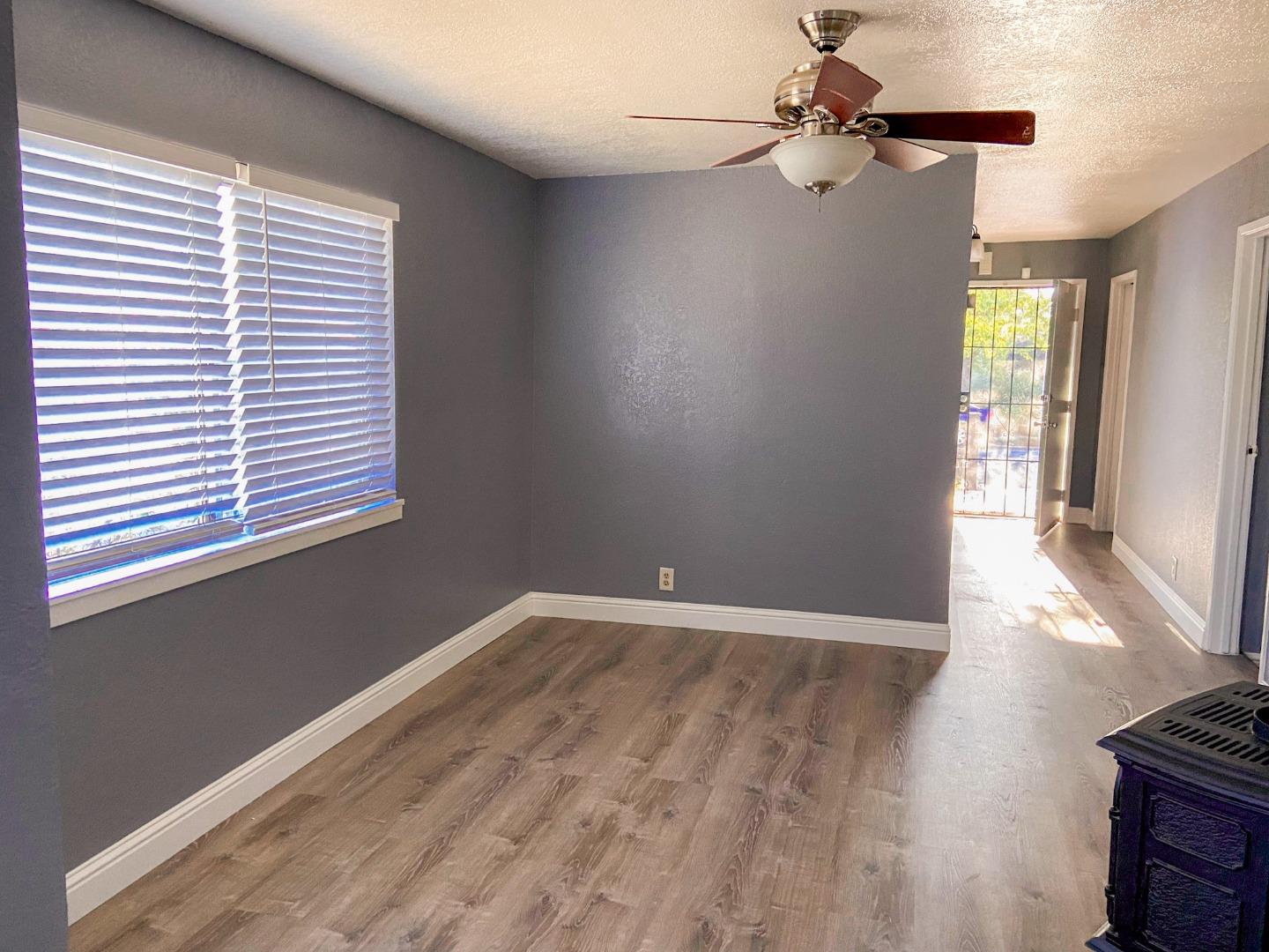 6152 Baker Street Oakland, CA 94608 - Photo 23 of 23 wooden floor in an empty room with a window
