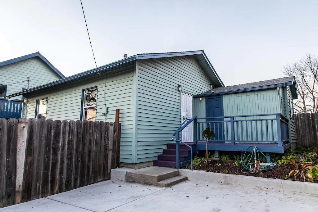 6152 Baker Street Oakland, CA 94608 - Photo 4 of 23 a front view of a house