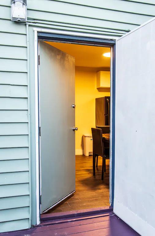 6152 Baker Street Oakland, CA 94608 - Photo 5 of 23 a view of a living room with a wooden floor